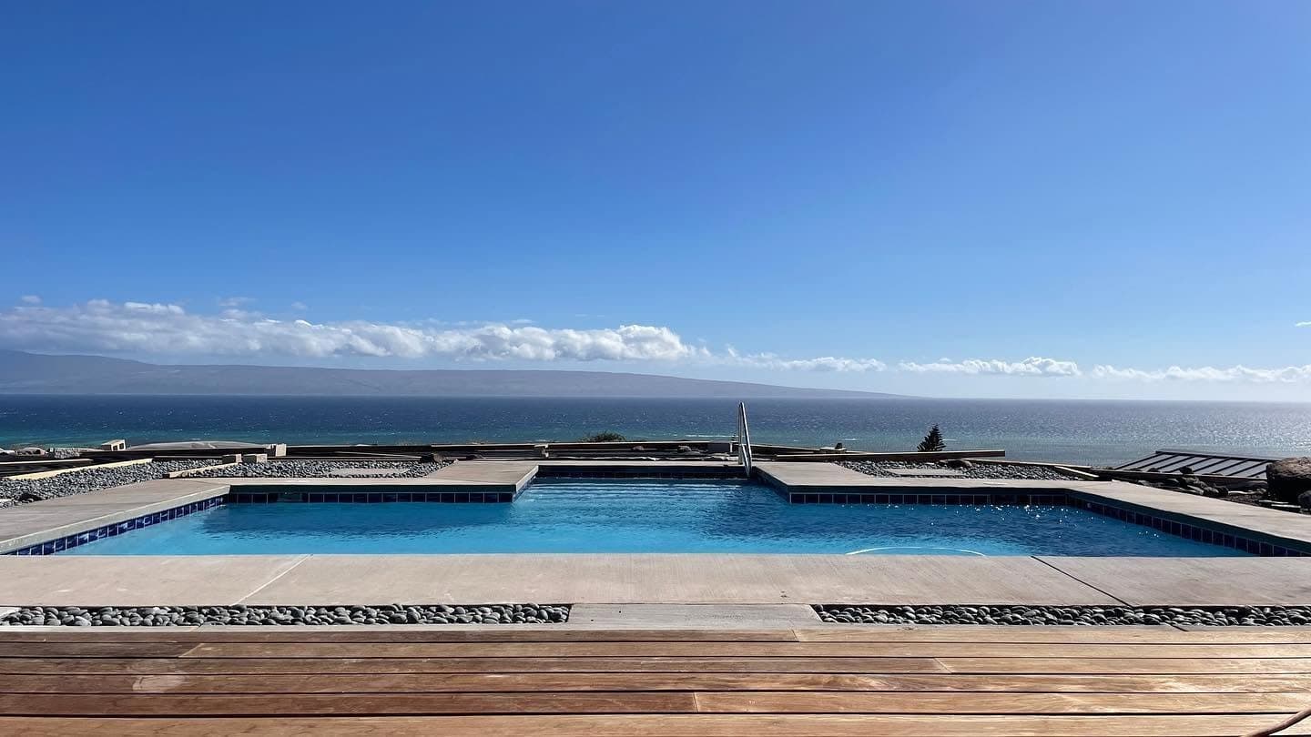 An oceanfront pool deck on Molokaʻi looking across the Pacific to the neighbor islands